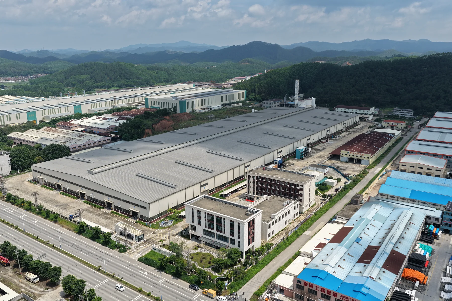 container-house-manufacturing-facility-aerial-view container house factory
