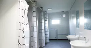 Casa contenedor prefabricada multifuncional de paquete plano.