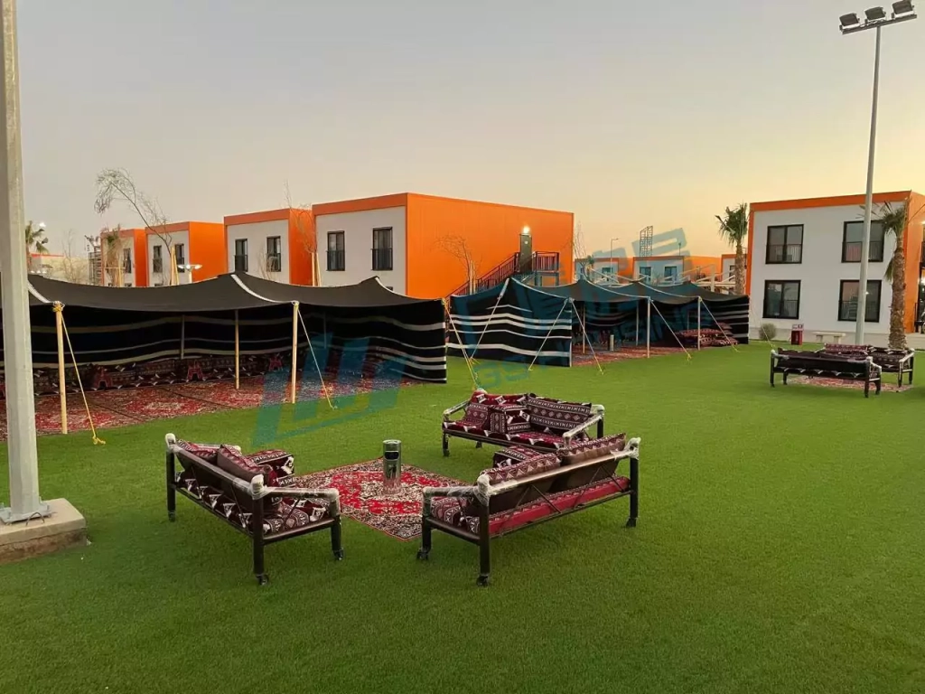 Container home outdoor scene showing eco-friendly modular housing placed on grass with modern living setup