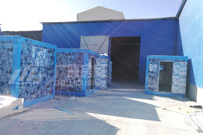 container house units with camouflage panels at project site container house units with camouflage panels at project site