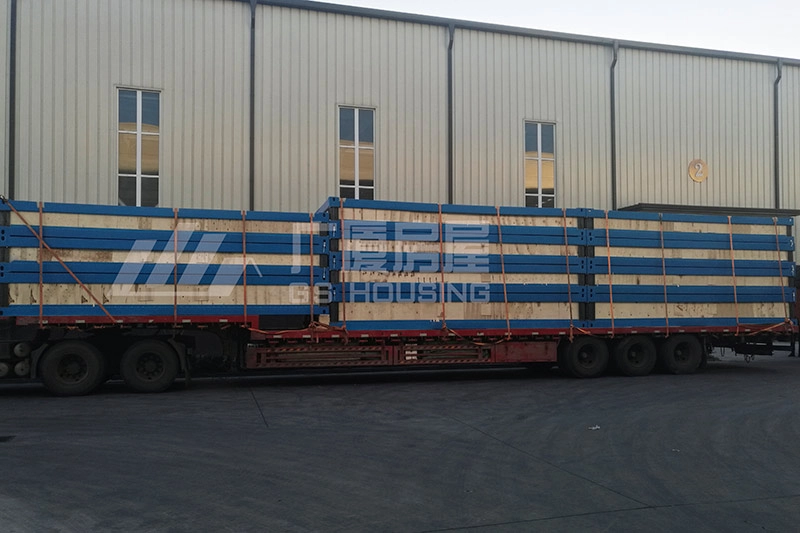 flat pack container house modules loaded on truck for delivery flat pack container house modules loaded on truck for delivery