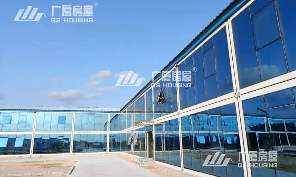 flat packed container house office building with glass facade