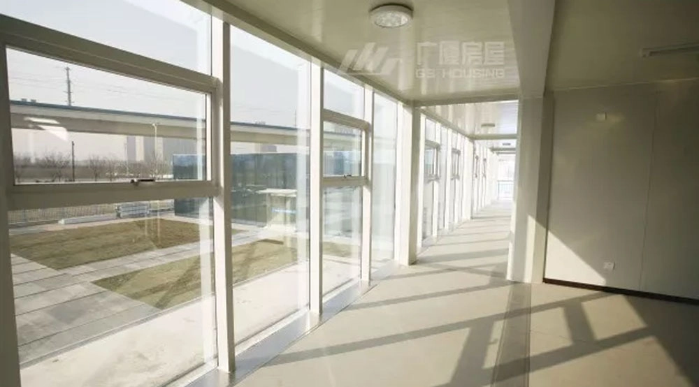 glass corridor inside modular exhibition park building with natural daylight glass corridor inside modular exhibition park building with natural daylight