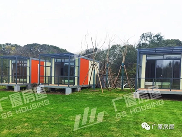 lakeside resort accommodation buildings integrated with natural landscape