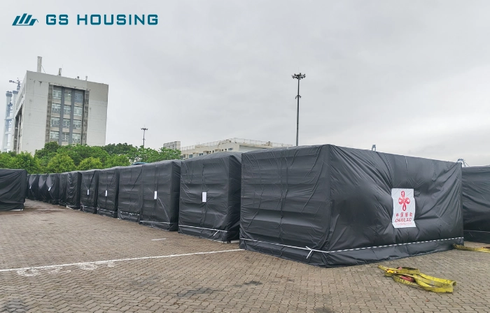 modular building units wrapped for transport and storage site