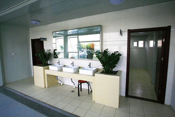 modular building washroom with sinks, mirror and clean interior modular building washroom with sinks, mirror and clean interior