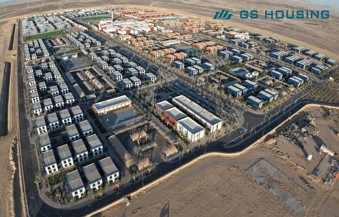 modular housing camp aerial view construction site container layout