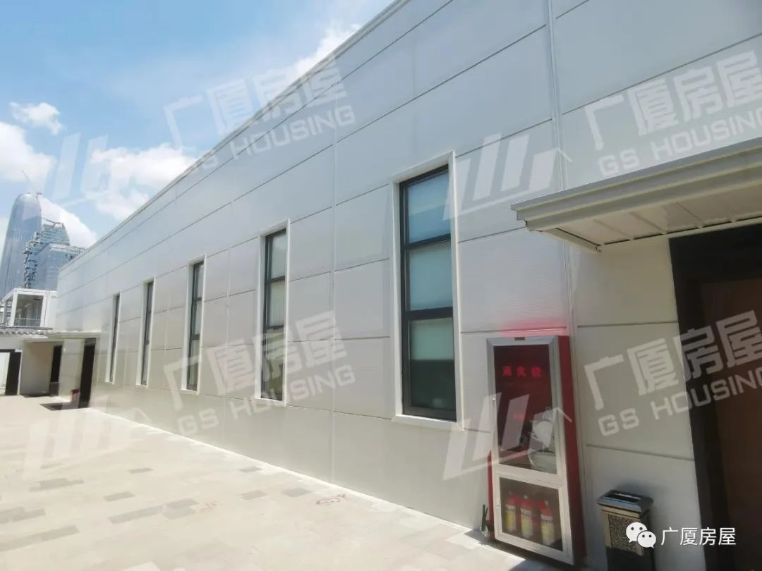 modular office and accommodation building exterior with clean façade and site access road