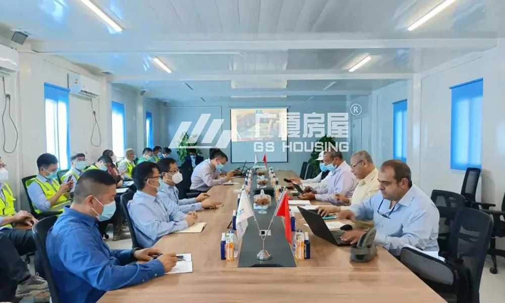 prefab container house meeting room with conference table and chairs
