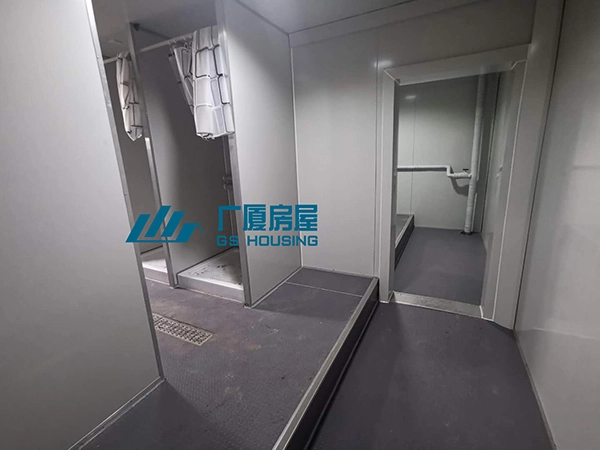 shower room inside modular military camp accommodation building