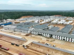 Modular sanitary containers integrated with worker accommodation facilities for large construction camps