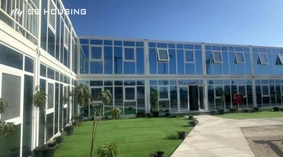 container office camp building exterior with glass facade for Chile hospital construction project