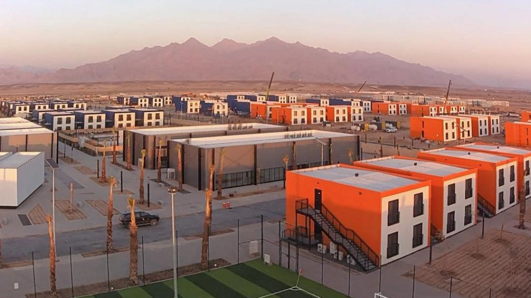 labor camp accommodation buildings with orange modular units in NEOM site
