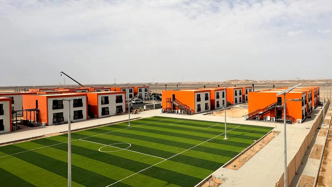labor camp sports field and modular worker housing in Saudi Arabia