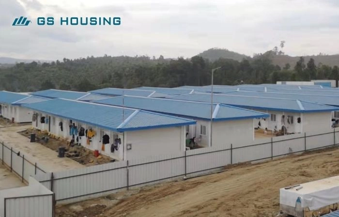 mining camp modular accommodation buildings with blue roof and site road