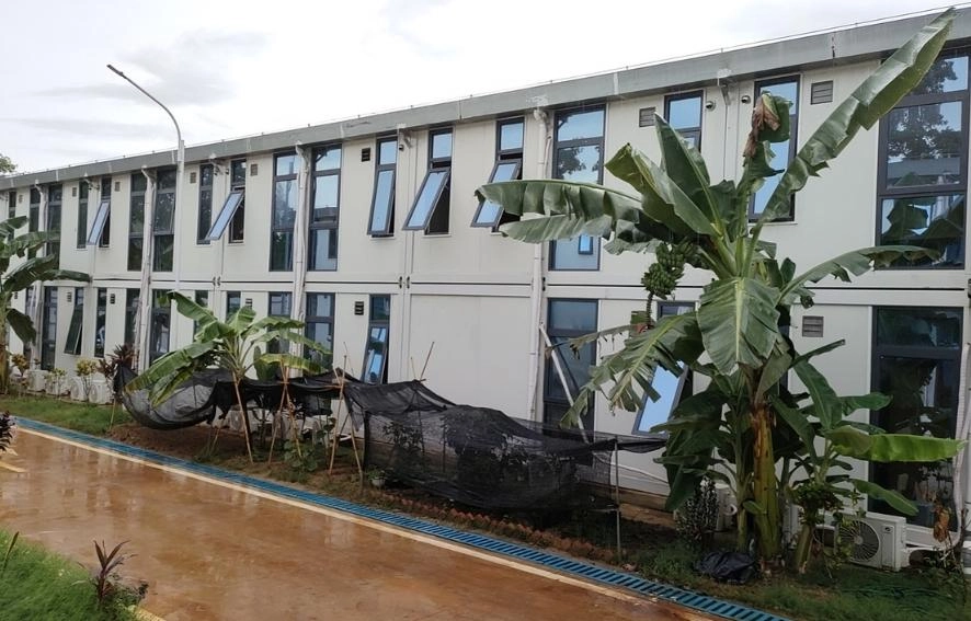 mining camp two storey worker accommodation building with landscaped walkway