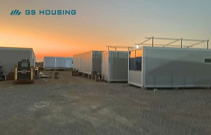modular camp flat pack house units at sunset in Oman construction site