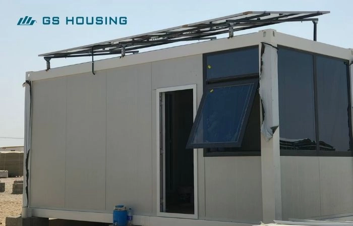 modular camp office unit with window and solar panel frame in Oman