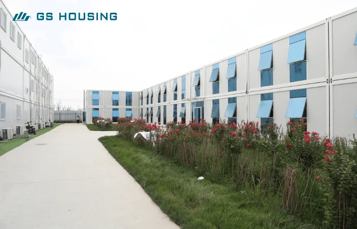 prefab construction camp accommodation building walkway and landscaped courtyard