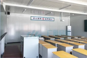 modular school classroom interior with teacher desks and student learning space