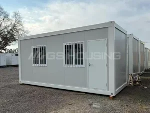 Single-storey flat pack container accommodation units arranged side by side at an Argentina project site